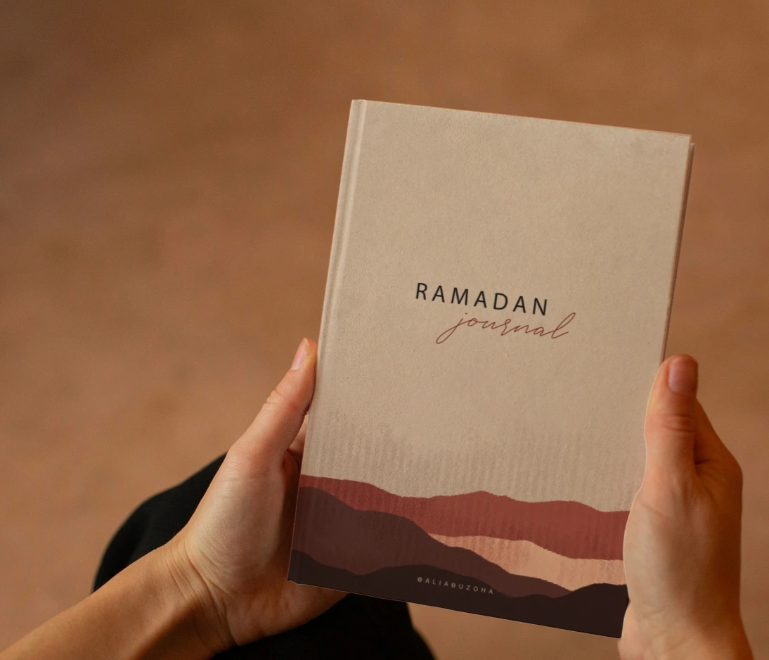 Hands holding the journal